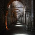 brown brick tunnel during daytime