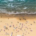 aerial view of seashore forming waves