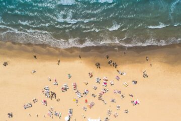 aerial view of seashore forming waves