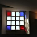 a window with a red and blue light