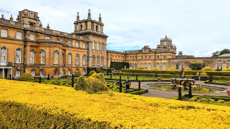 A large building with a garden in front of it