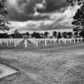 cemetery under cloudy sky