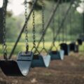 selective focus shot of outdoor swing