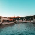 body of water under blue sky