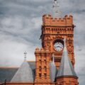 a large brick building with a clock tower